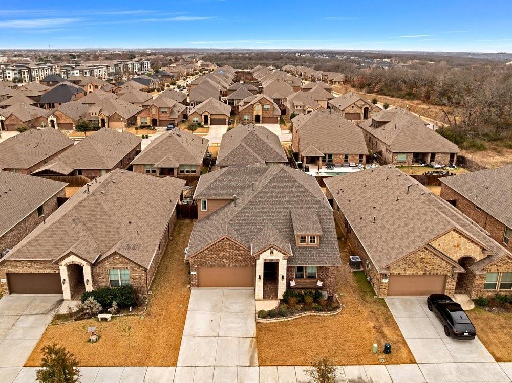 4105 Ranchman Boulevard Denton, TX 76210 - Photo 37 of 39 an aerial view of residential houses with outdoor space