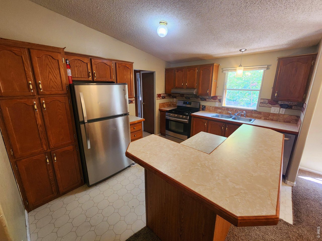 425 Platte Street Sterling, CO 80751 - Photo 11 of 22 back house kitchen