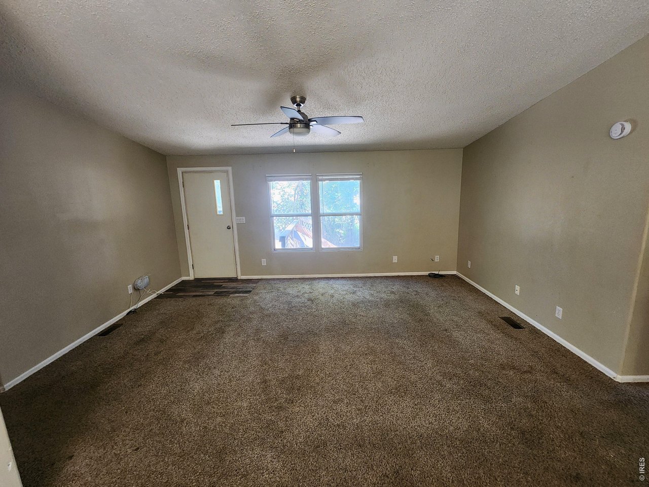 425 Platte Street Sterling, CO 80751 - Photo 15 of 22 back house living room