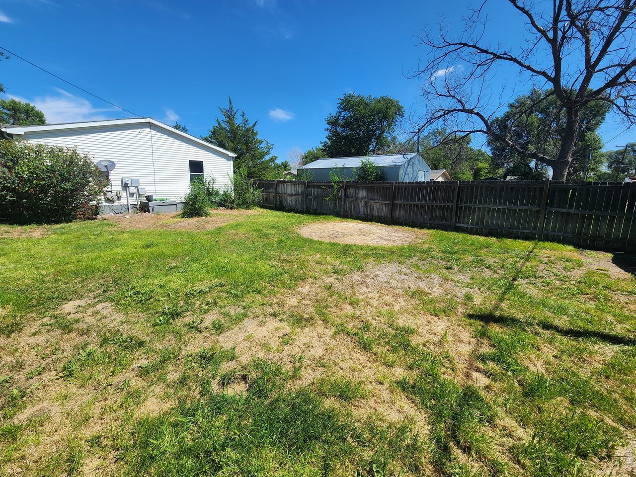 425 Platte Street Sterling, CO 80751 - Photo 22 of 22 backhouse backyard