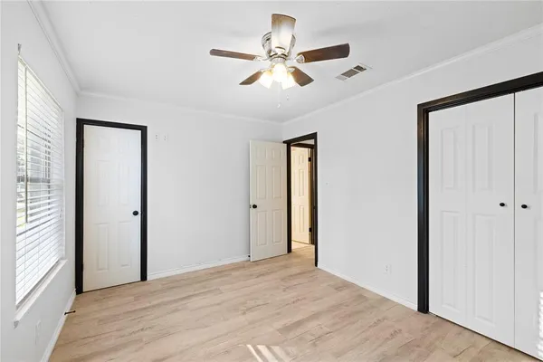 a view of a room with a window