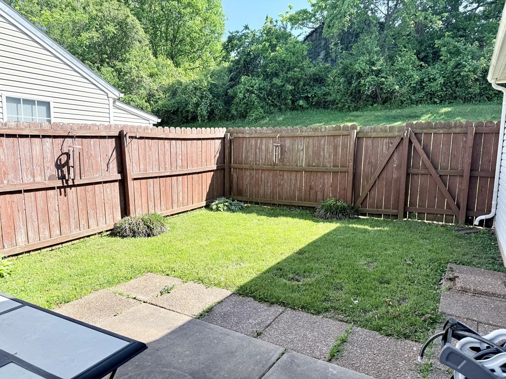 497 Sivley Road Hopkinsville, KY 42240 - Photo 17 of 20 a view of a backyard with a garden