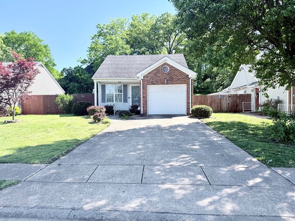 497 Sivley Road Hopkinsville, KY 42240 - Photo 20 of 20 a front view of a house with yard and green space
