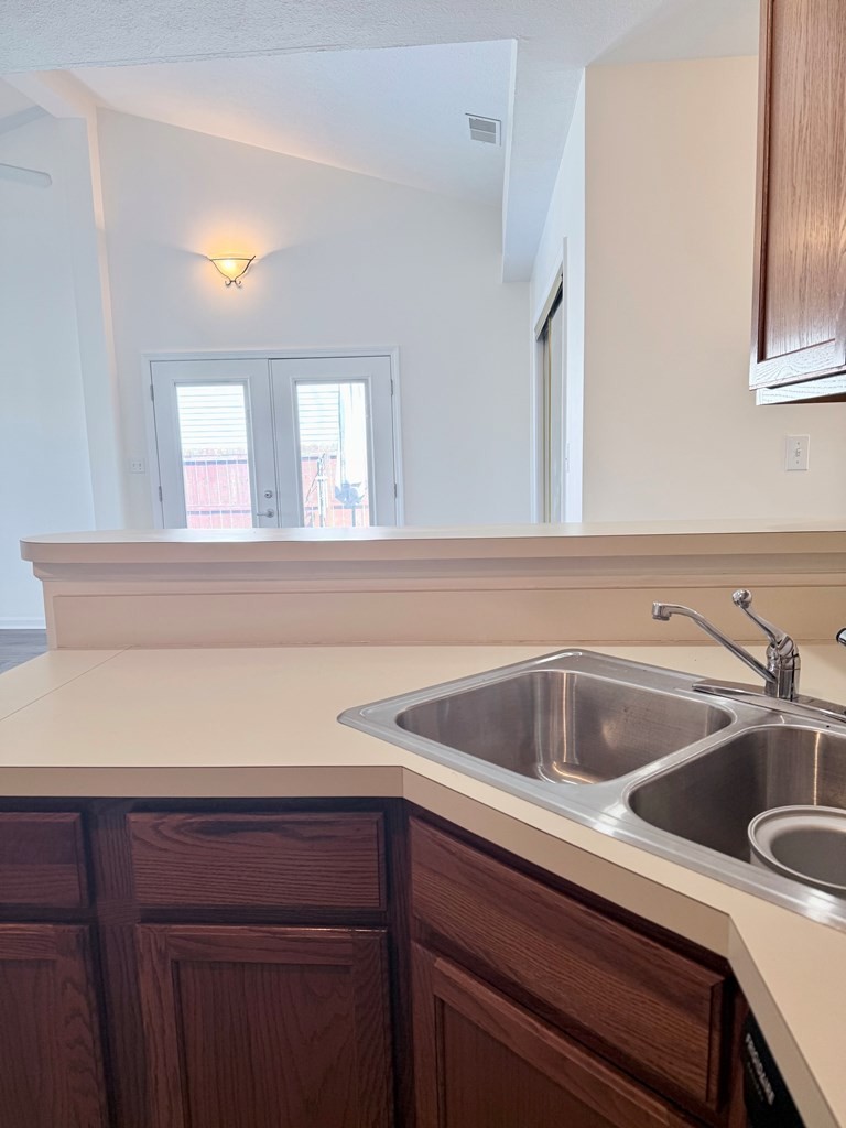 497 Sivley Road Hopkinsville, KY 42240 - Photo 10 of 20 a kitchen with a sink and cabinets