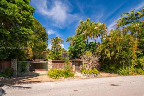 a living room with furniture window and wooden floor