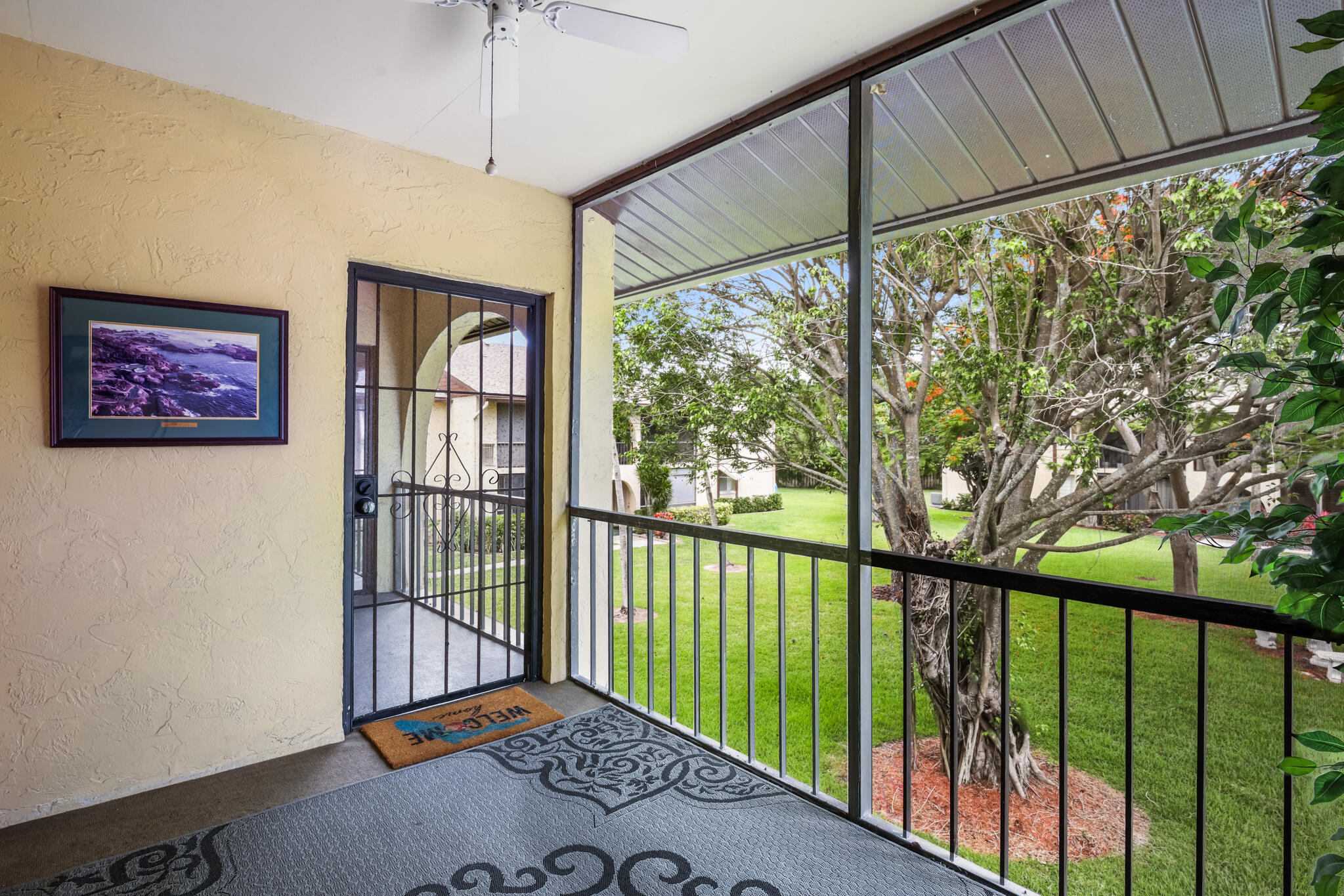 321 Pine Ridge Circle, Unit C2 Greenacres, FL 33463 - Photo 18 of 29 SCREENED BALCONY