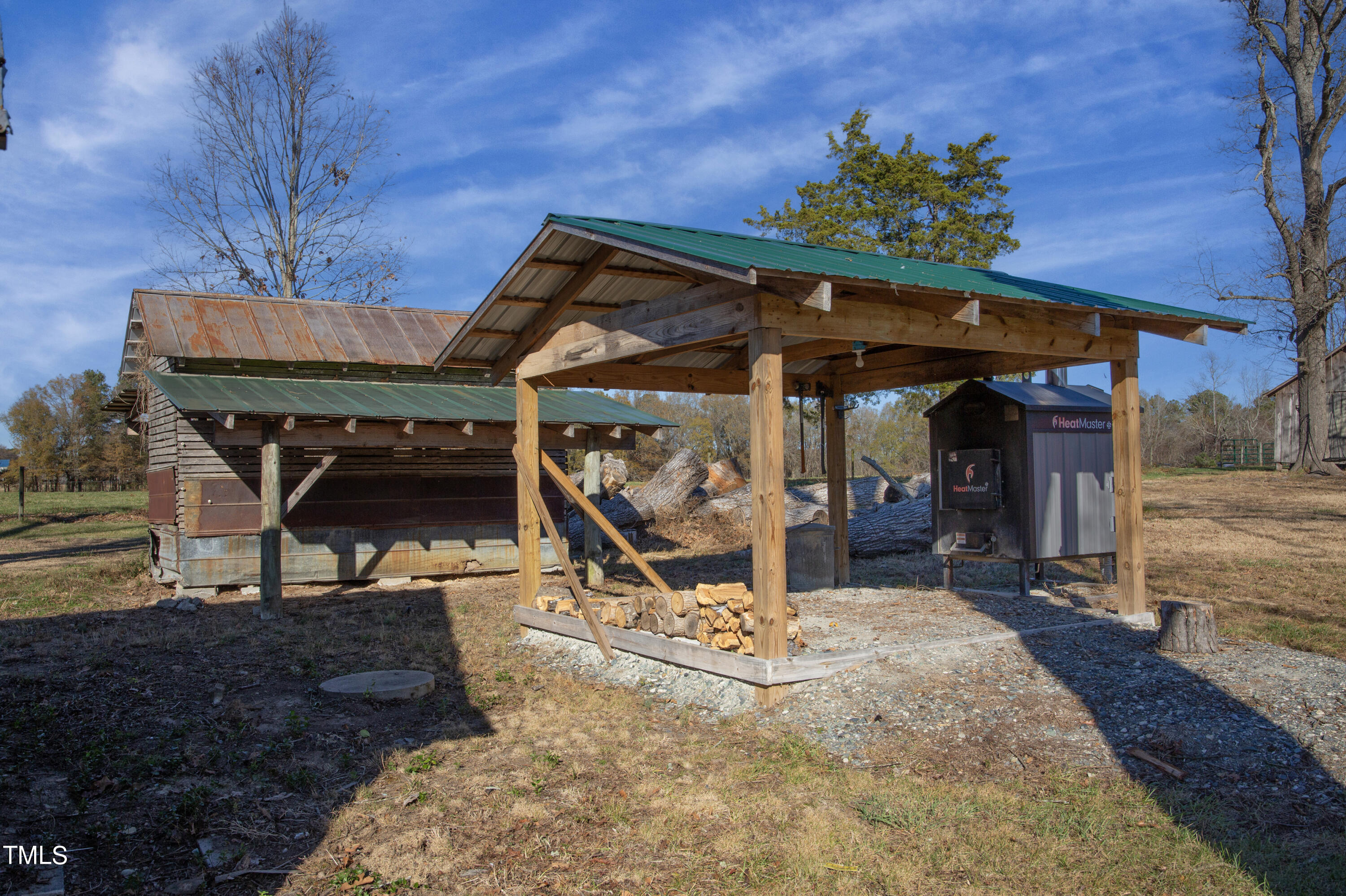 531 Archie Johnson Road Siler City, NC 27344 - Photo 13 of 46 a view of a chairs and table in the patio