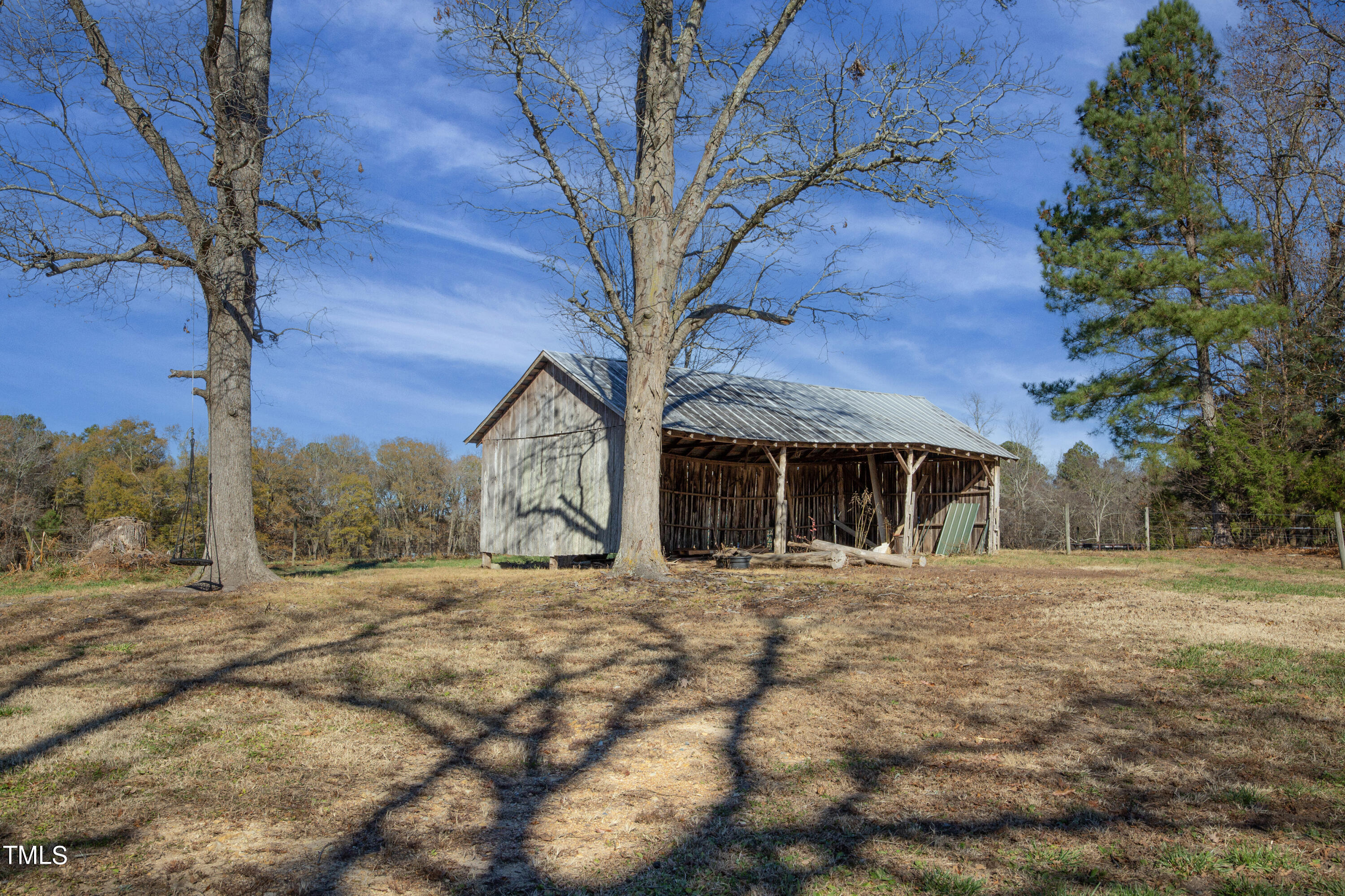 531 Archie Johnson Road Siler City, NC 27344 - Photo 14 of 46 a tree is standing in the yard