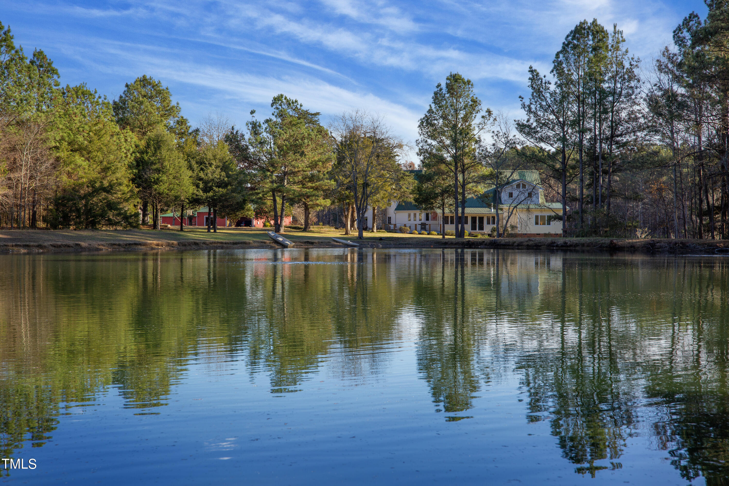 531 Archie Johnson Road Siler City, NC 27344 - Photo 18 of 46 a lake view with a sitting space and a lake view