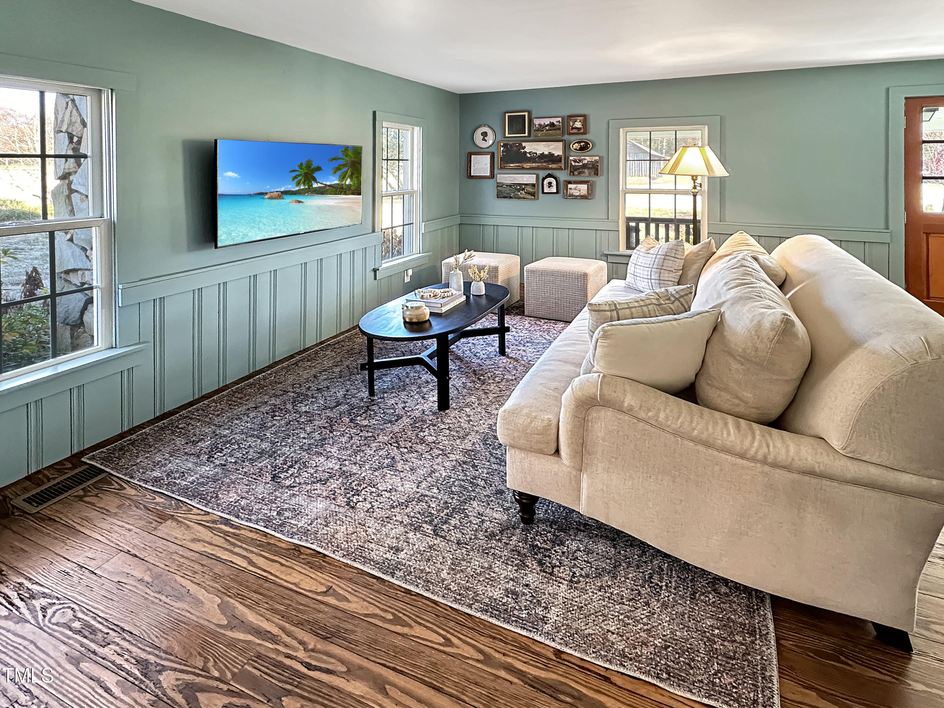 531 Archie Johnson Road Siler City, NC 27344 - Photo 20 of 46 a living room with furniture a rug and a window