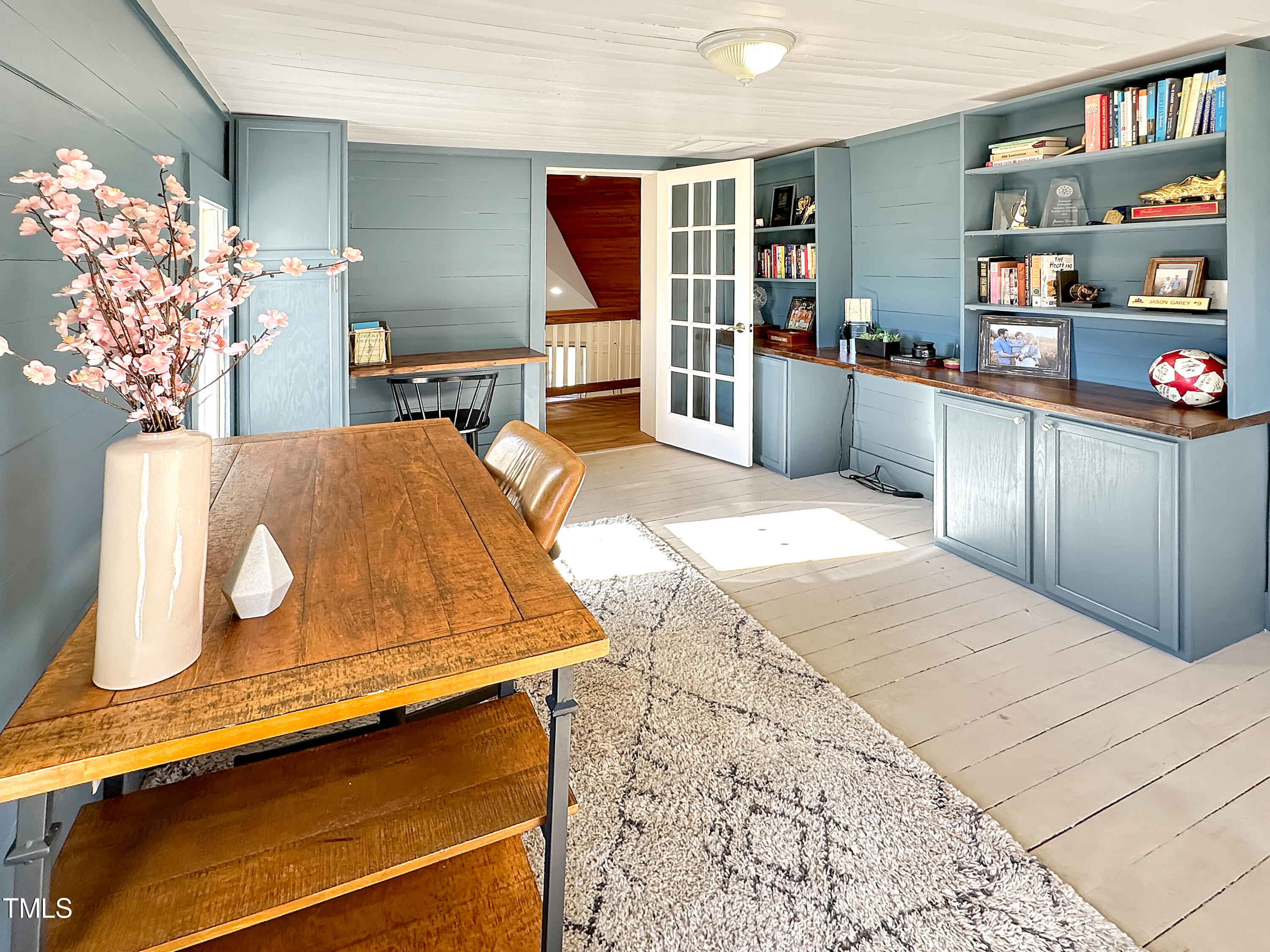 531 Archie Johnson Road Siler City, NC 27344 - Photo 21 of 46 a bedroom with a bed and a bookshelf