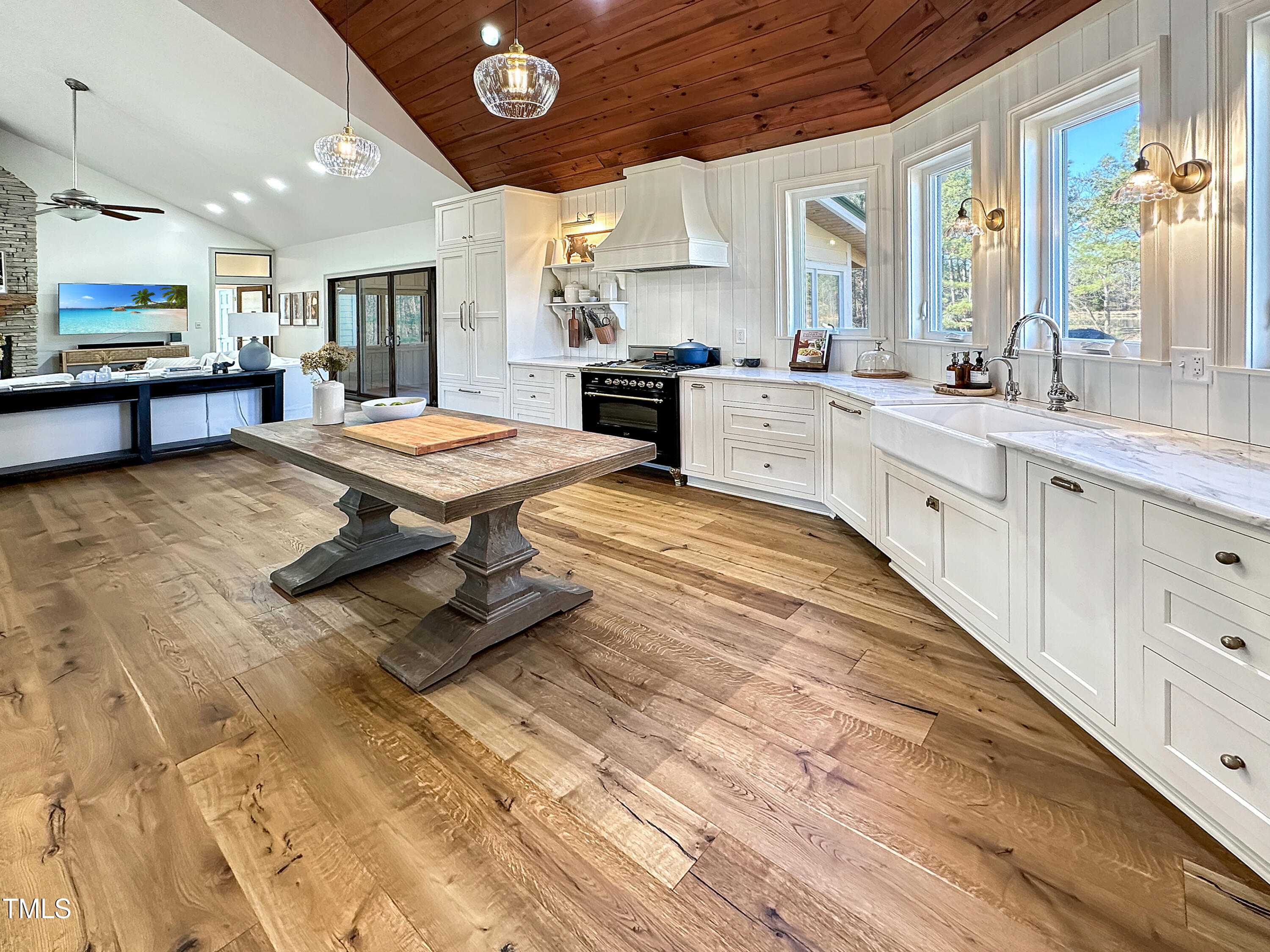 531 Archie Johnson Road Siler City, NC 27344 - Photo 25 of 46 a large white kitchen with a large window