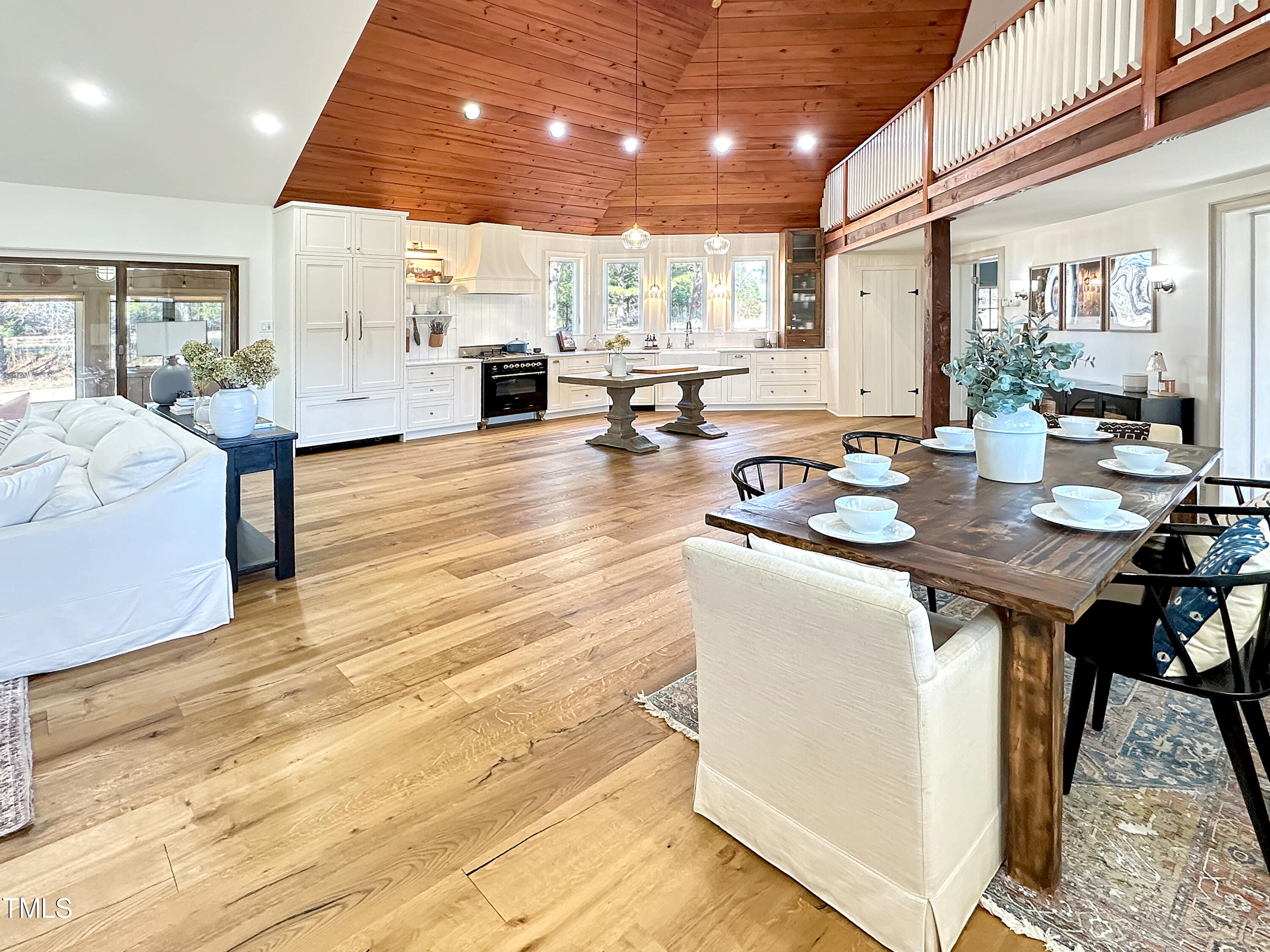 531 Archie Johnson Road Siler City, NC 27344 - Photo 27 of 46 a living room with furniture and a wooden floor