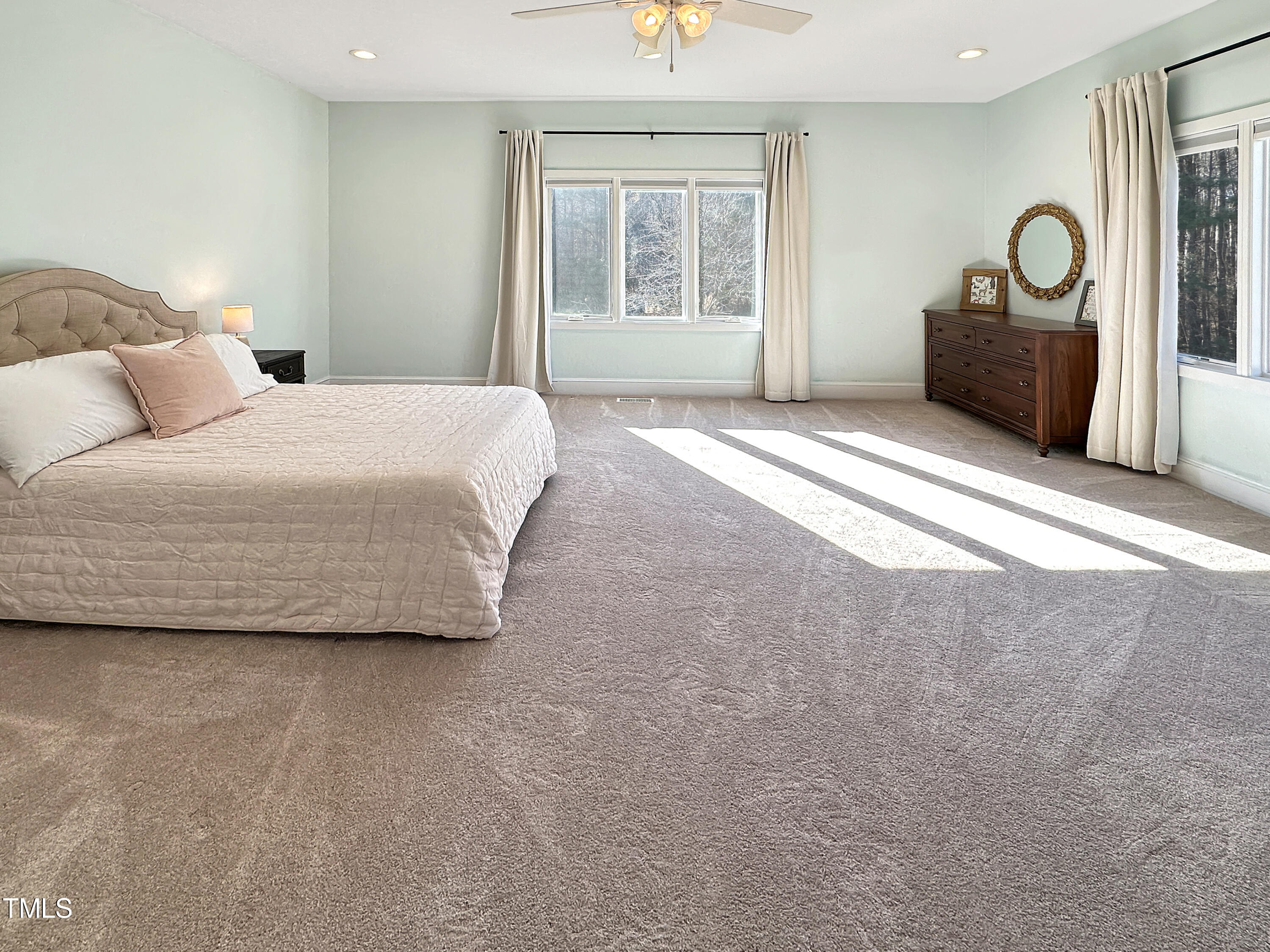 531 Archie Johnson Road Siler City, NC 27344 - Photo 37 of 46 a bedroom with a bed and window