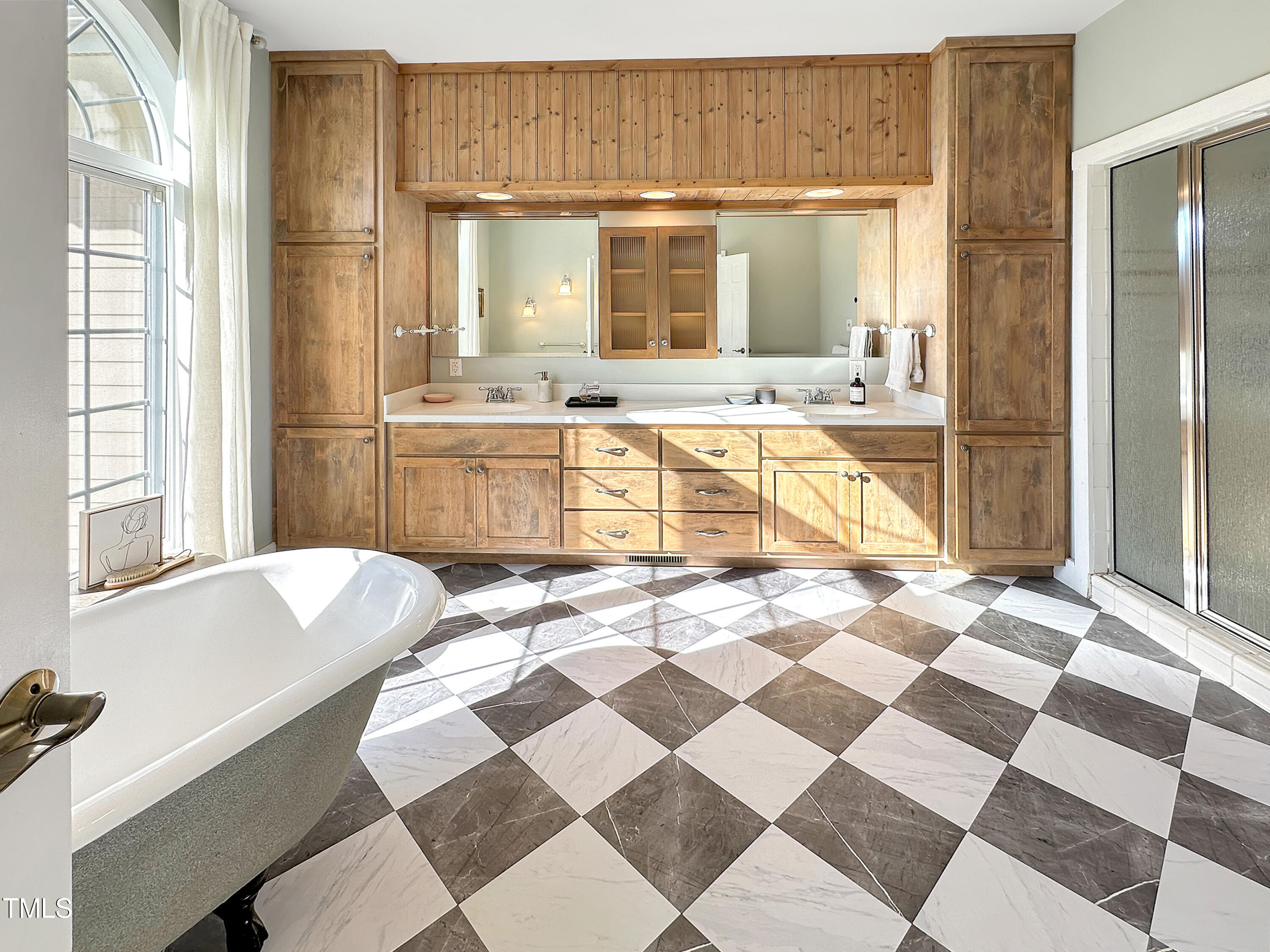 531 Archie Johnson Road Siler City, NC 27344 - Photo 40 of 46 a spacious bathroom with a tub shower and sink