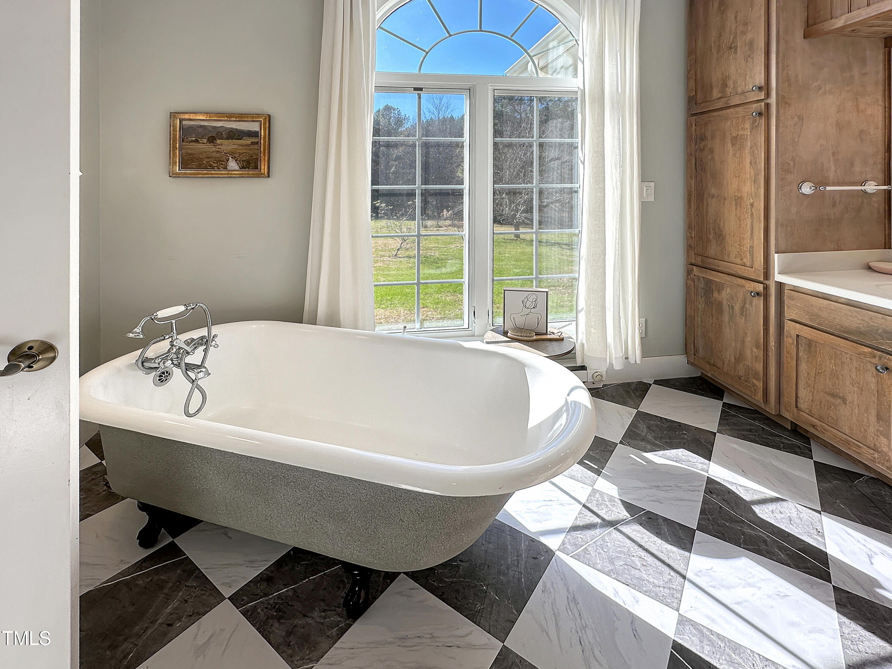 531 Archie Johnson Road Siler City, NC 27344 - Photo 41 of 46 a white bath tub sitting next to a white sink