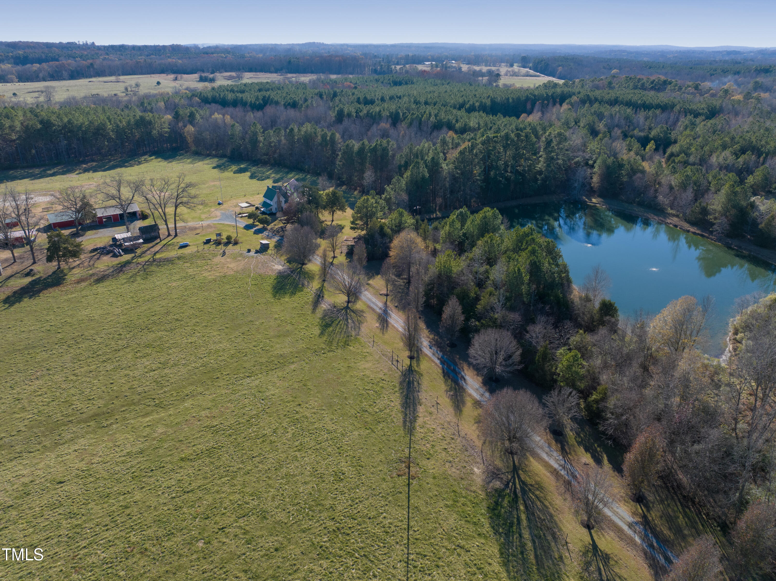 531 Archie Johnson Road Siler City, NC 27344 - Photo 5 of 46 a view of a lake with a mountain in the back
