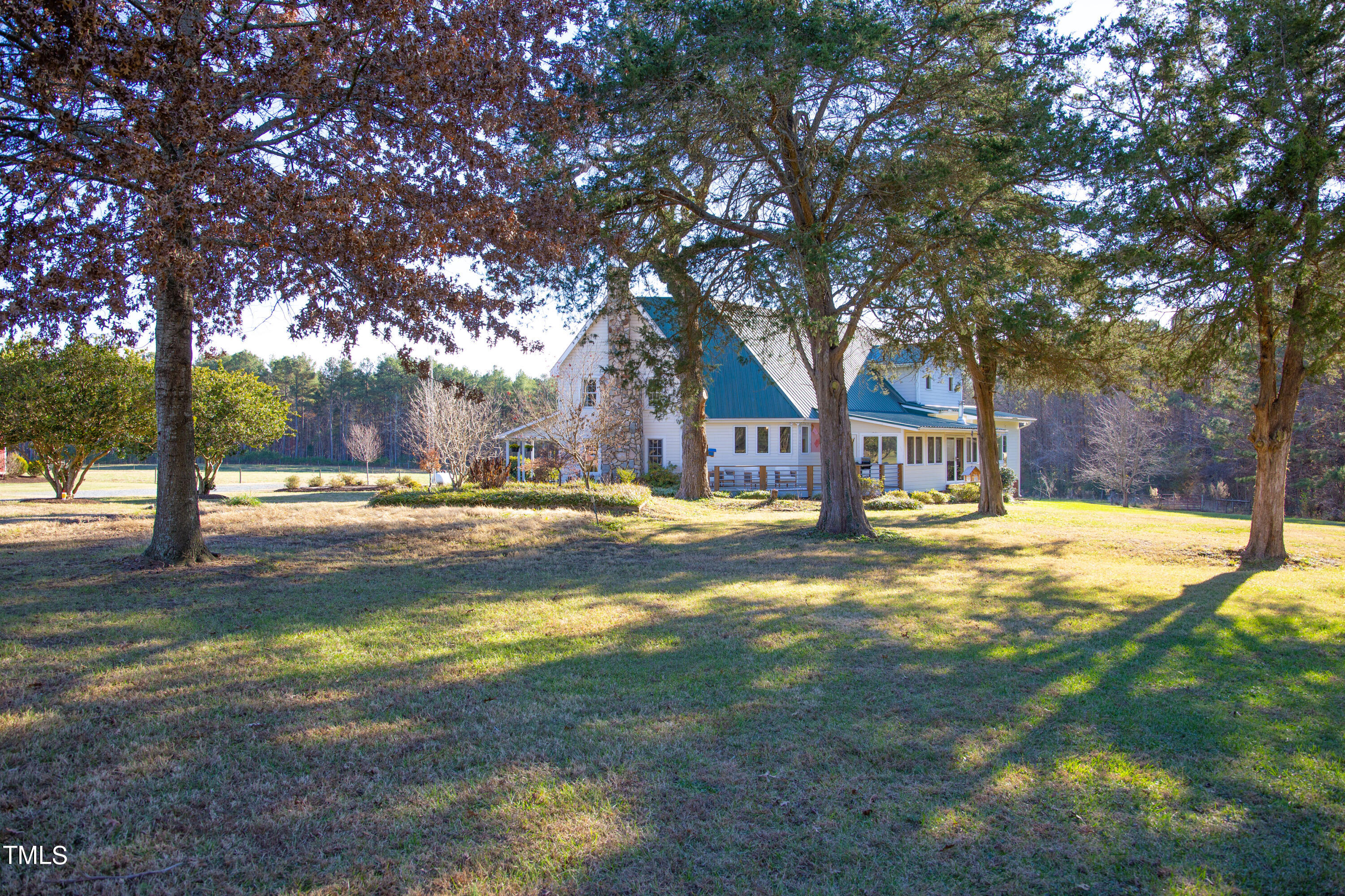531 Archie Johnson Road Siler City, NC 27344 - Photo 6 of 46 a view of yard with swimming pool and trees