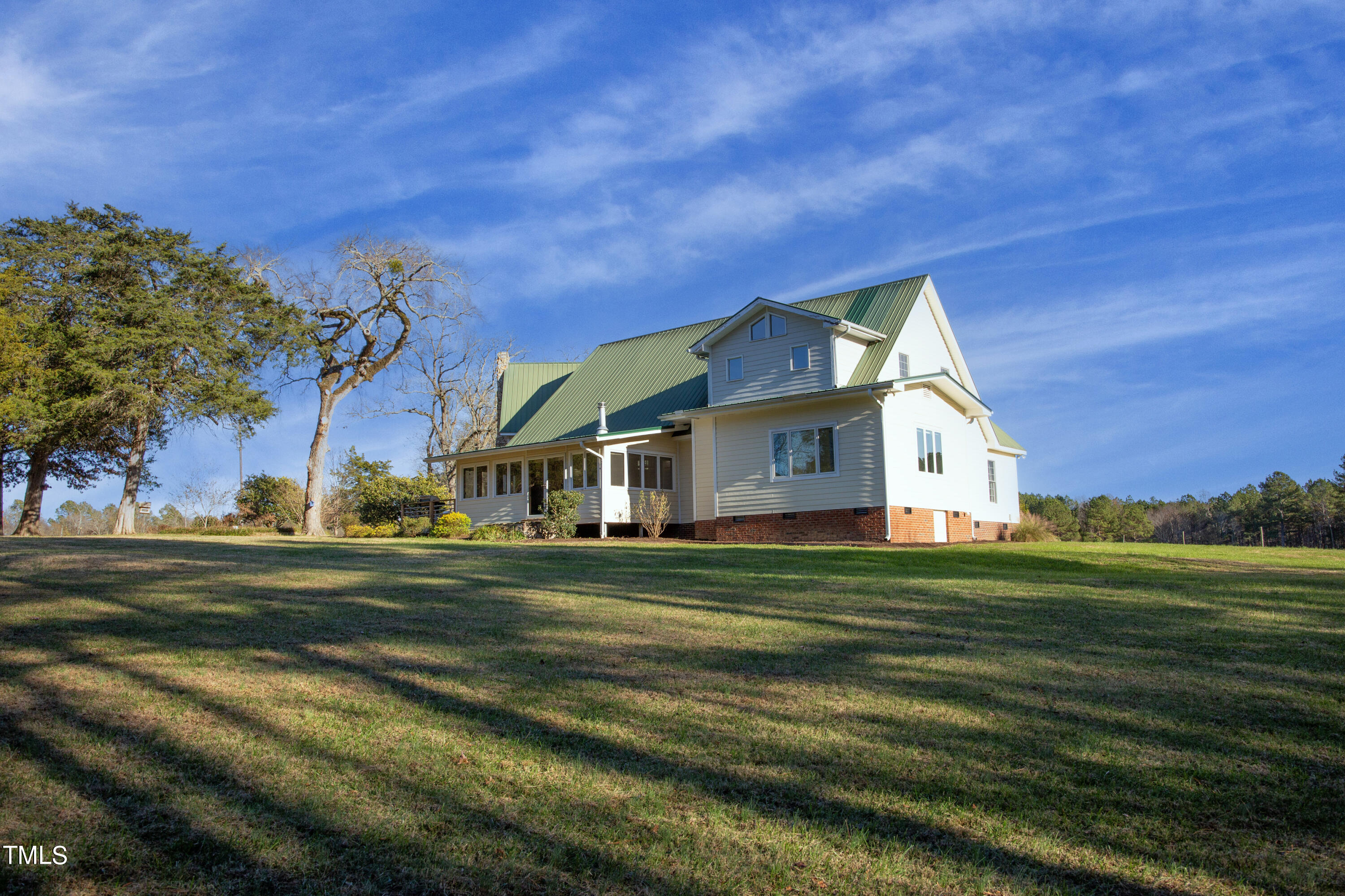 531 Archie Johnson Road Siler City, NC 27344 - Photo 7 of 46 a front view of house with outdoor space and trees
