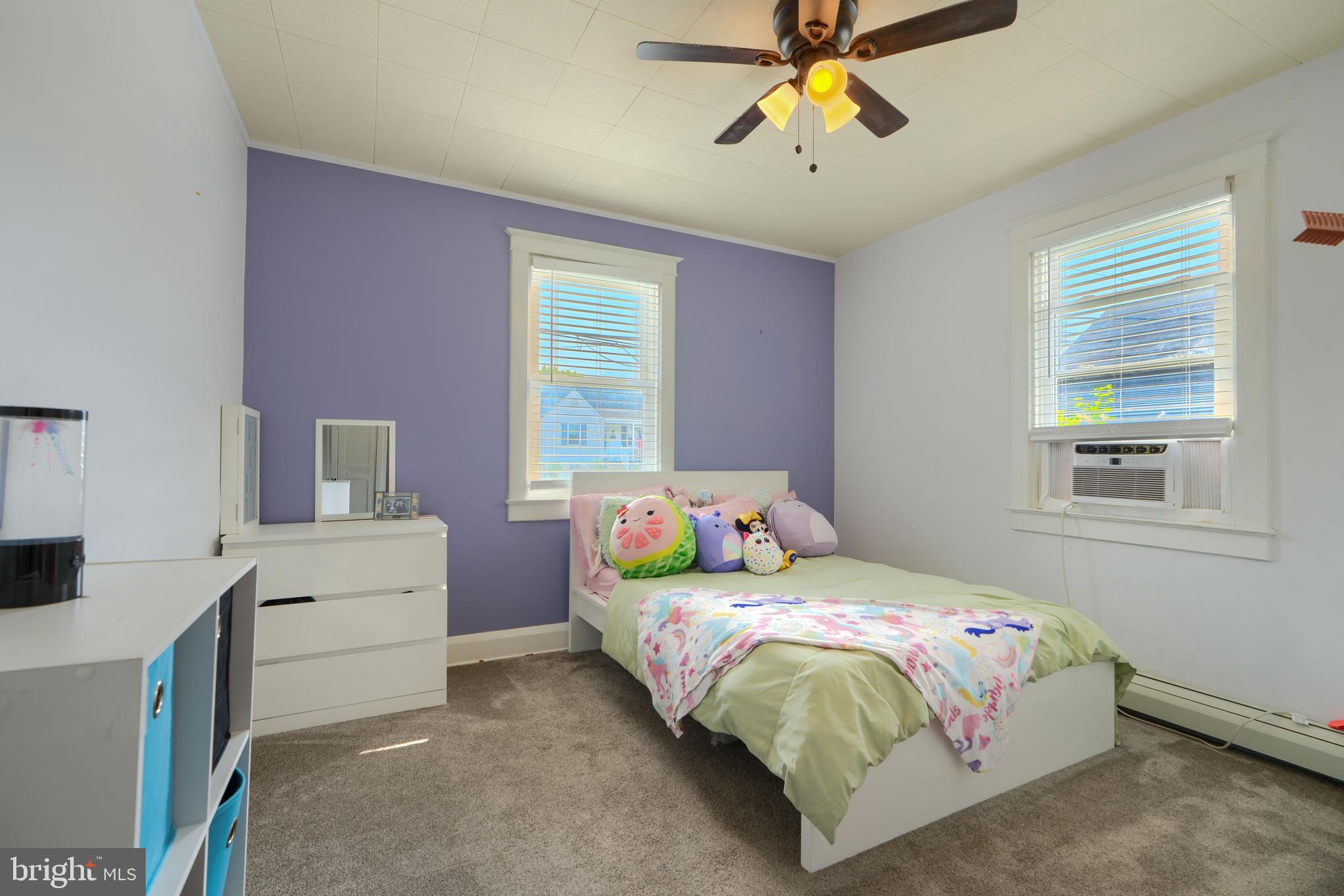 2818 Garnet Road Baltimore, MD 21234 - Photo 17 of 39 a bedroom with a bed and window