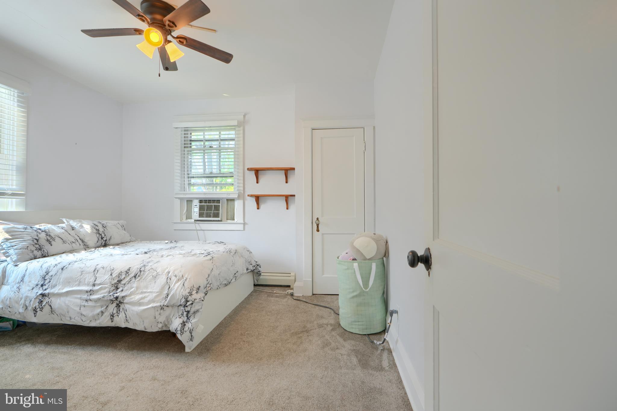 2818 Garnet Road Baltimore, MD 21234 - Photo 24 of 39 a bedroom with a bed and window