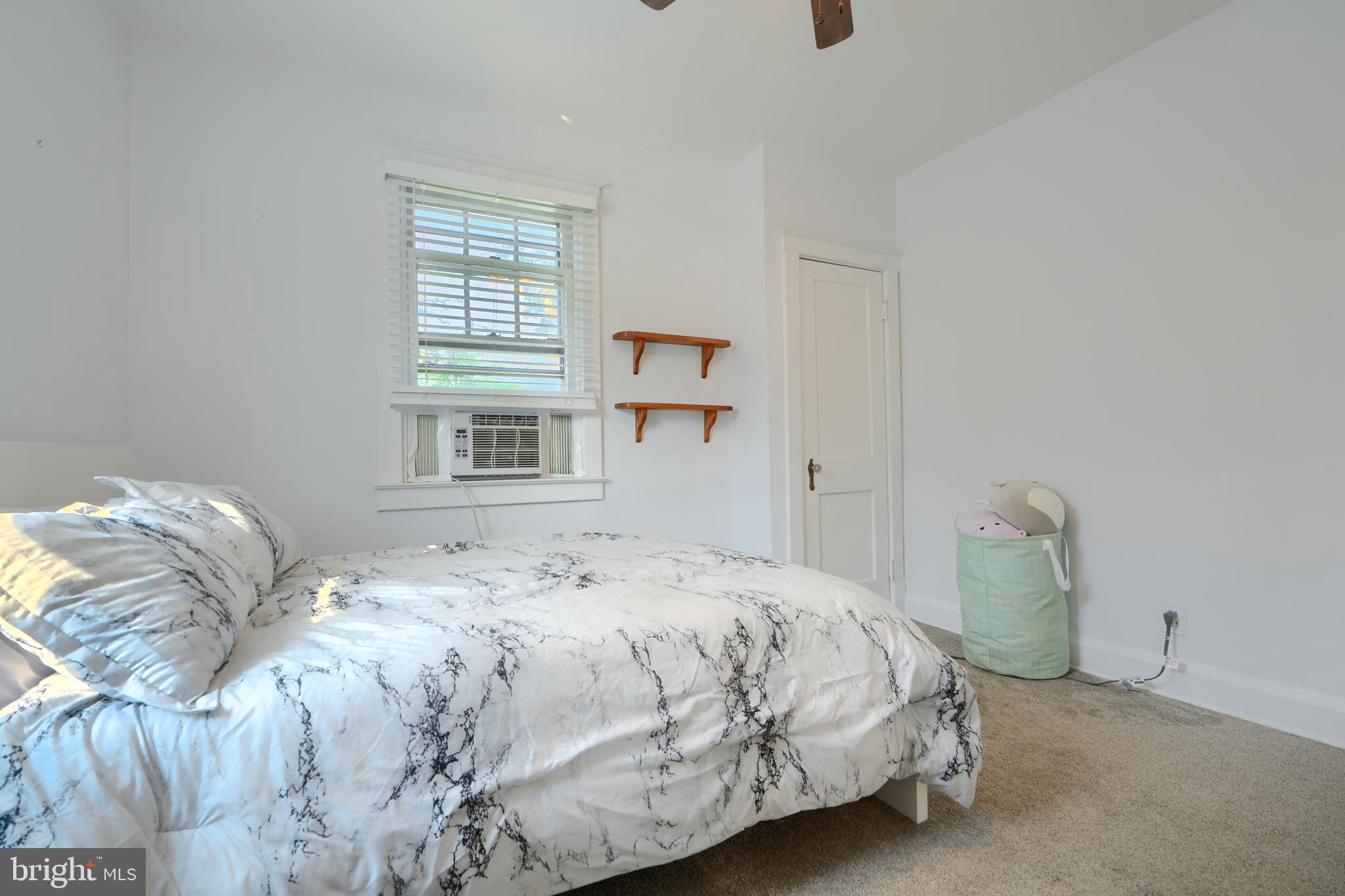 2818 Garnet Road Baltimore, MD 21234 - Photo 27 of 39 a bedroom with a bed and a window