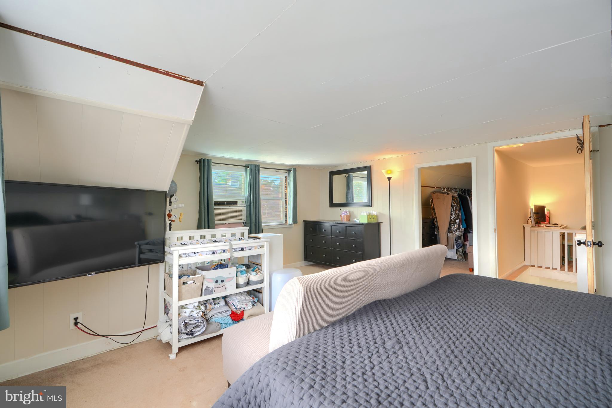 2818 Garnet Road Baltimore, MD 21234 - Photo 31 of 39 a living room with furniture and a flat screen tv