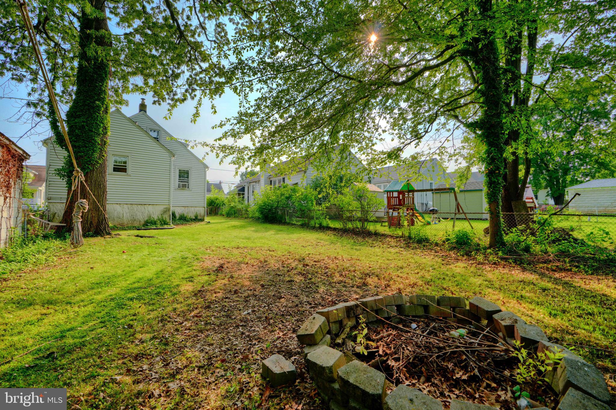 2818 Garnet Road Baltimore, MD 21234 - Photo 34 of 39 a backyard of a house with lots of green space