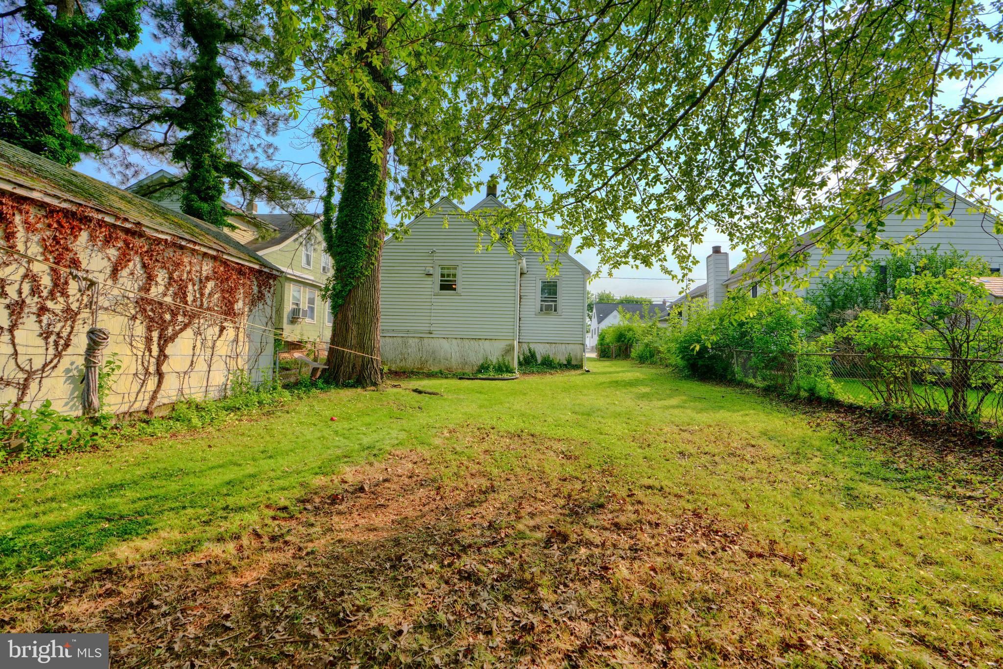2818 Garnet Road Baltimore, MD 21234 - Photo 35 of 39 a front view of house with garden