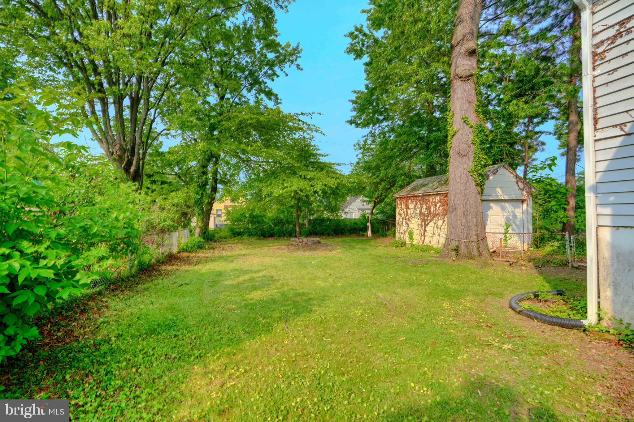 2818 Garnet Road Baltimore, MD 21234 - Photo 37 of 39 a view of a big yard with large trees