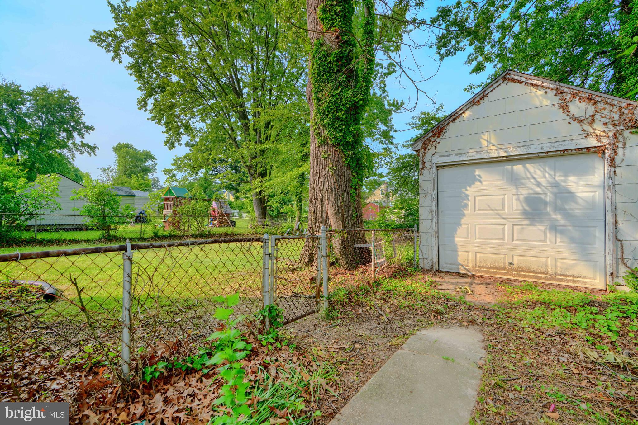 2818 Garnet Road Baltimore, MD 21234 - Photo 39 of 39 a backyard of a house with lots of green space