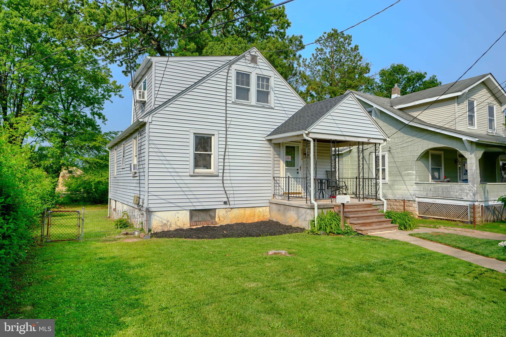 2818 Garnet Road Baltimore, MD 21234 - Photo 4 of 39 a front view of house with yard and green space