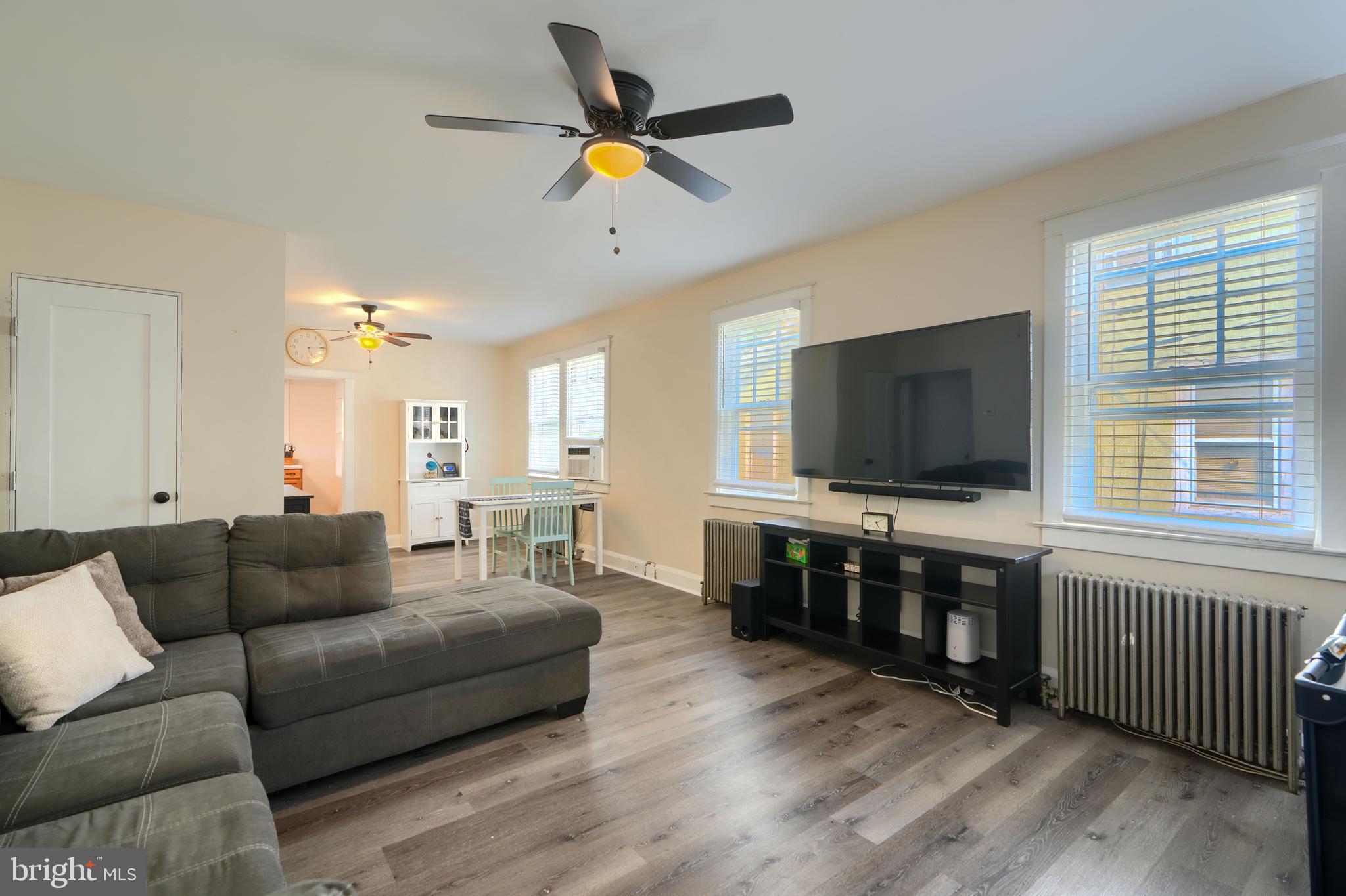 2818 Garnet Road Baltimore, MD 21234 - Photo 6 of 39 a living room with furniture and a flat screen tv