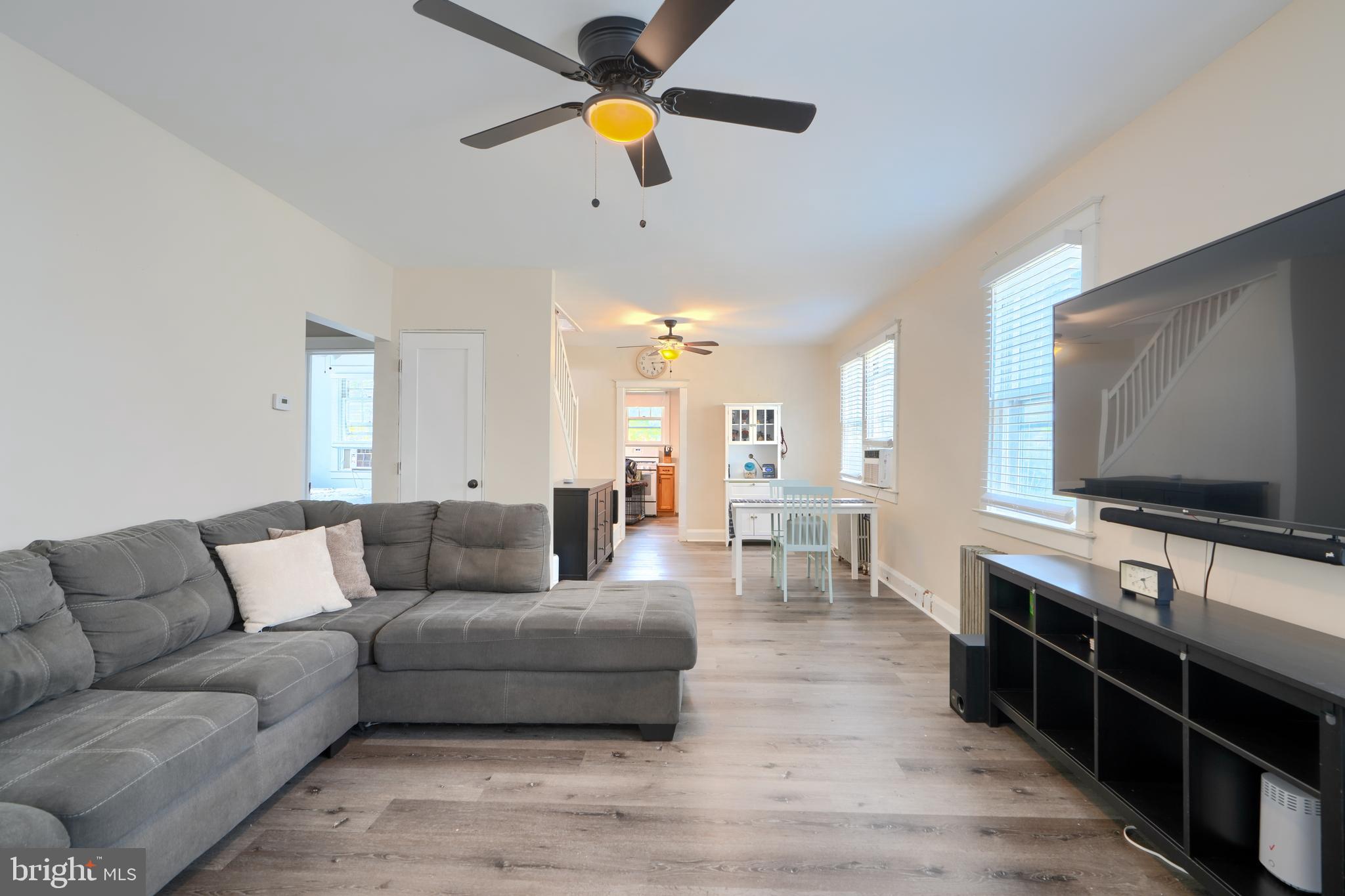 2818 Garnet Road Baltimore, MD 21234 - Photo 7 of 39 a living room with furniture and a flat screen tv