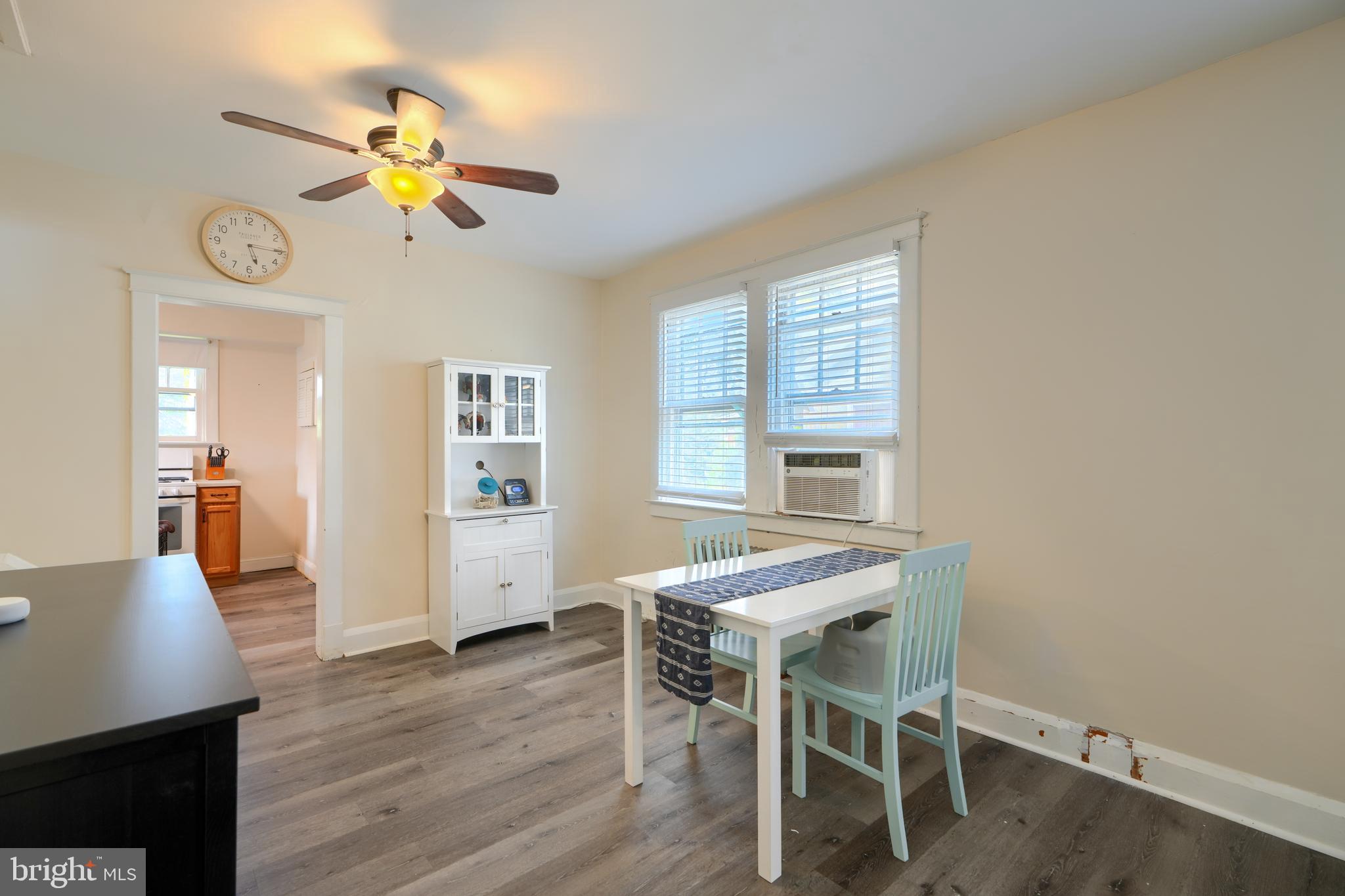 2818 Garnet Road Baltimore, MD 21234 - Photo 10 of 39 a view of a dining room with furniture and wooden floor