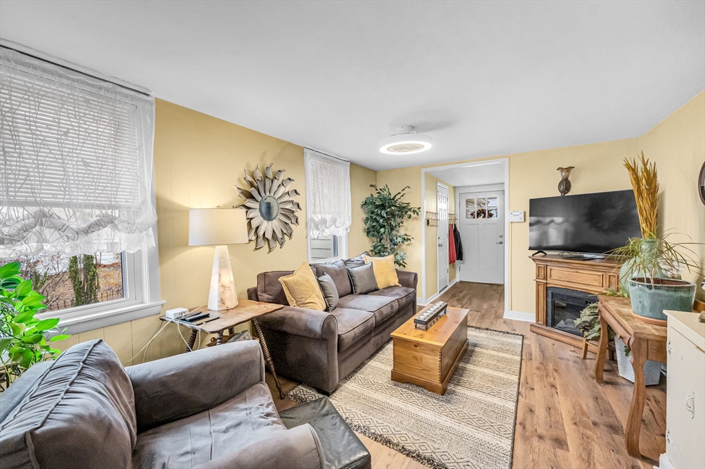 98 Pine Grove Street Springfield, MA 01119 - Photo 13 of 39 a living room with furniture and a flat screen tv
