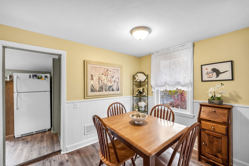 98 Pine Grove Street Springfield, MA 01119 - Photo 16 of 39 a view of a dining room with furniture and window