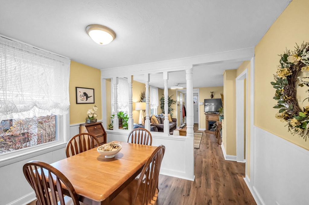 98 Pine Grove Street Springfield, MA 01119 - Photo 17 of 39 a dining room with furniture and wooden floor