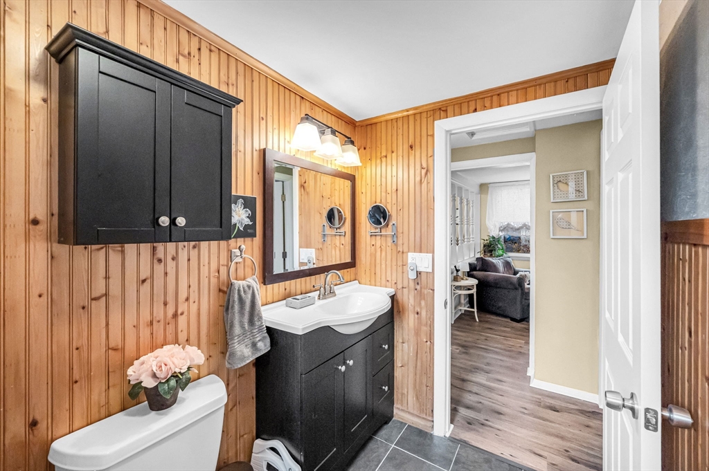 98 Pine Grove Street Springfield, MA 01119 - Photo 32 of 39 a spacious bathroom with a sink a mirror and a shower