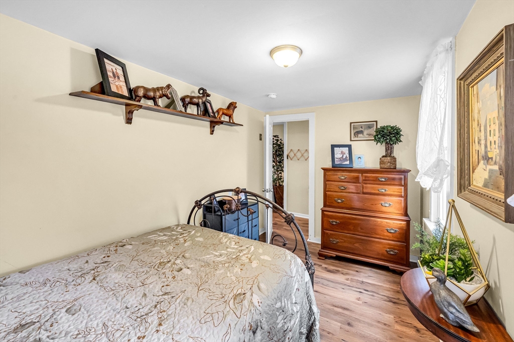 98 Pine Grove Street Springfield, MA 01119 - Photo 35 of 39 a bedroom with a bed and a window