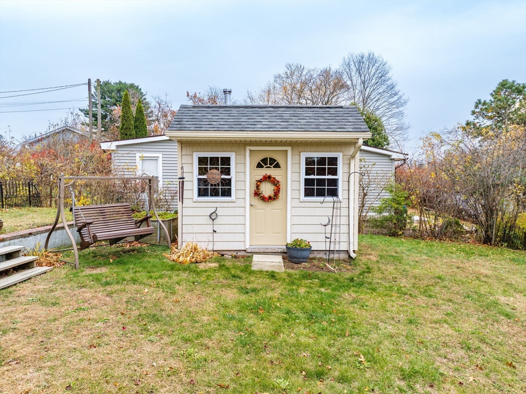 98 Pine Grove Street Springfield, MA 01119 - Photo 6 of 39 a view of a house with a yard