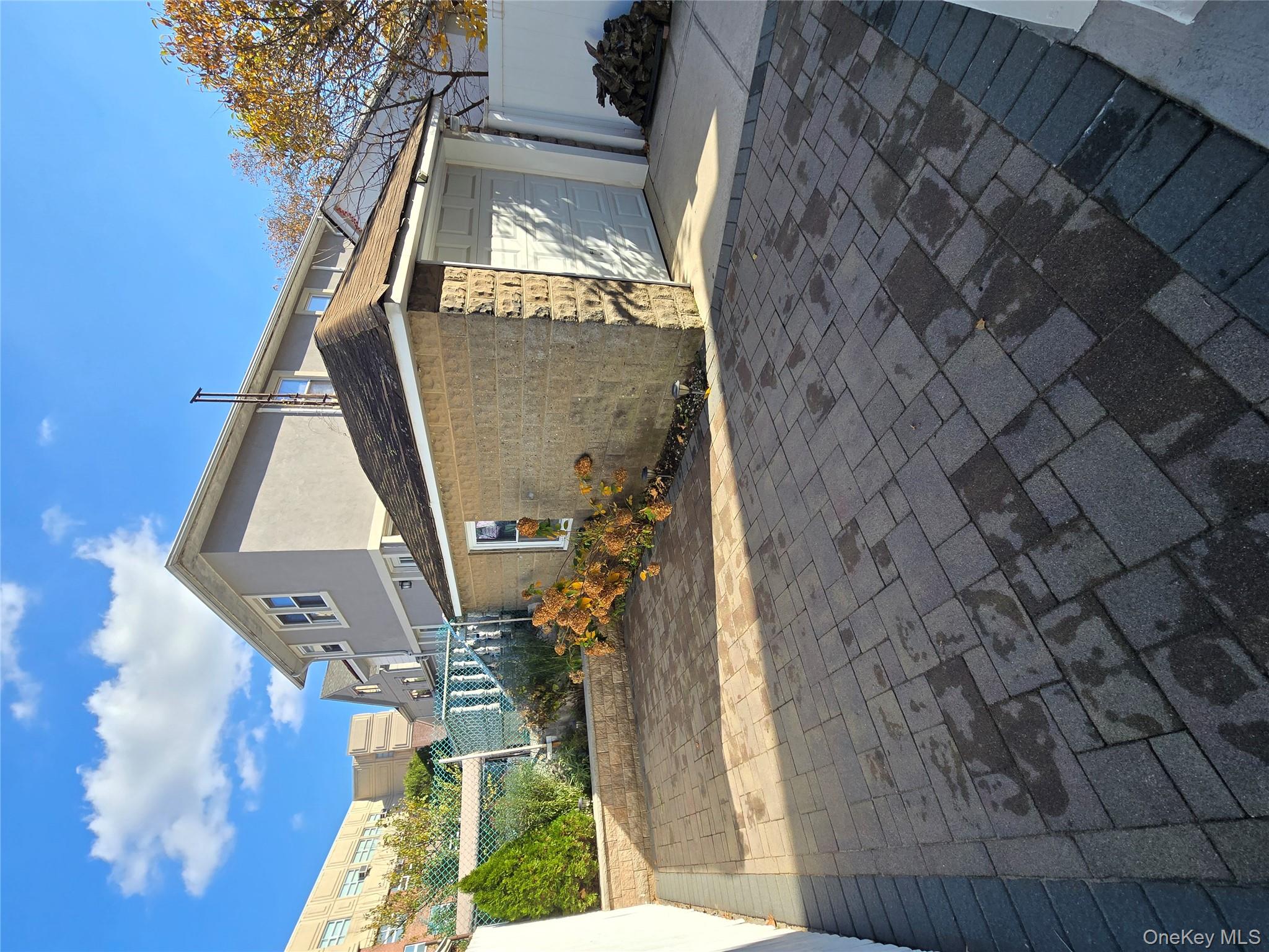 84-33 124th Street Queens, NY 11415 - Photo 4 of 27 a view of a house with a yard