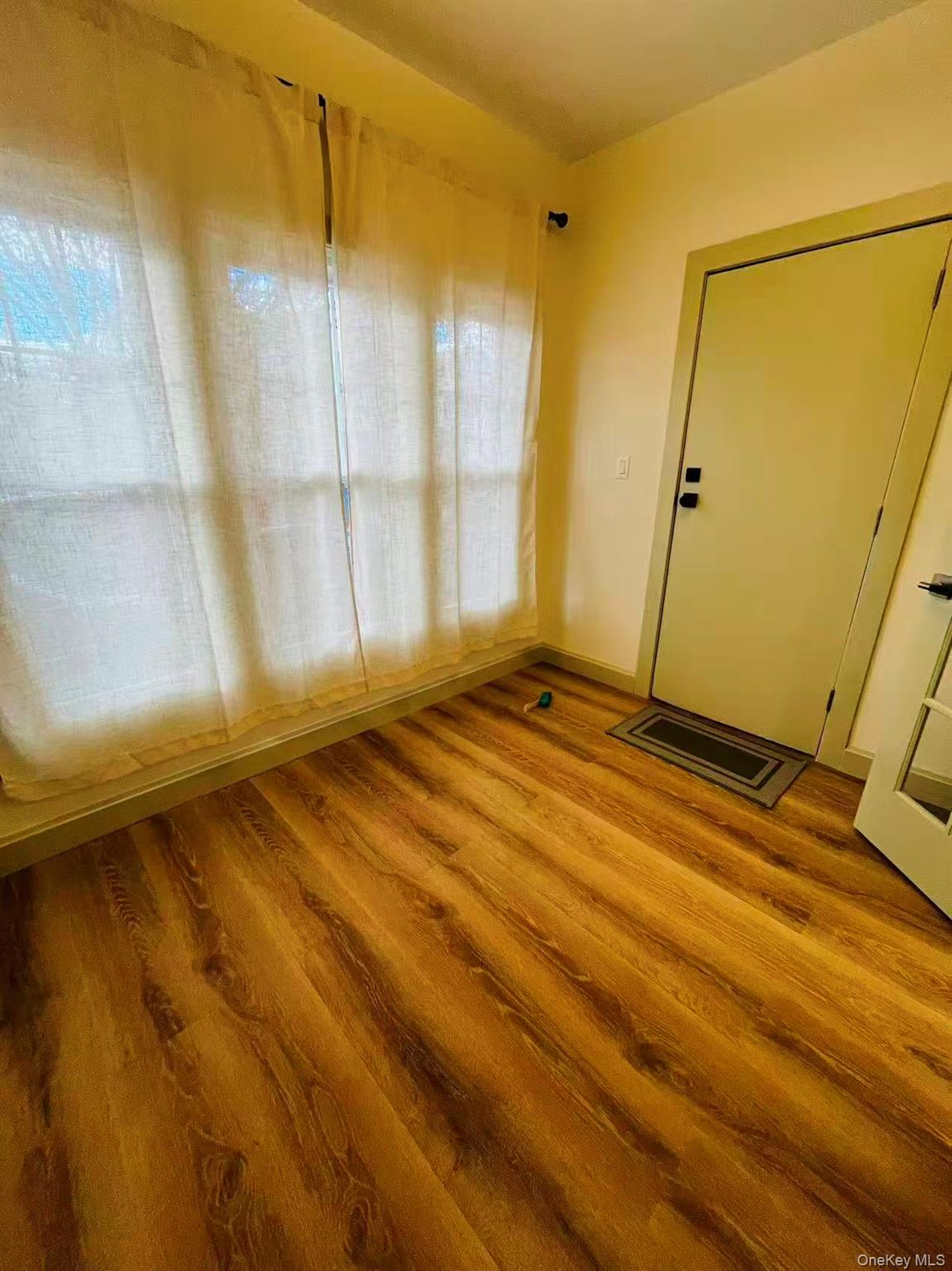 84-33 124th Street Queens, NY 11415 - Photo 6 of 27 a view of a room with a window