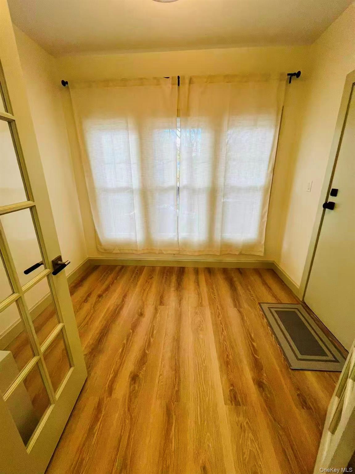 84-33 124th Street Queens, NY 11415 - Photo 7 of 27 a view of wooden floor