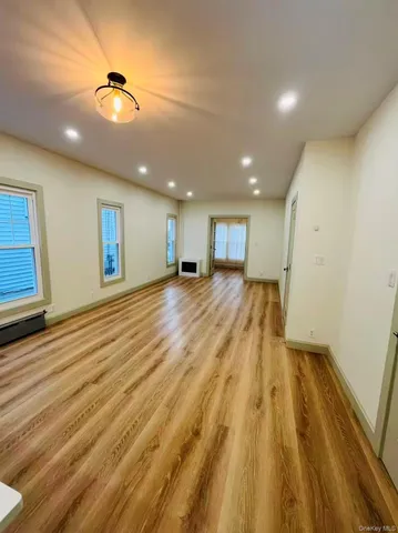 a view of a kitchen with a sink