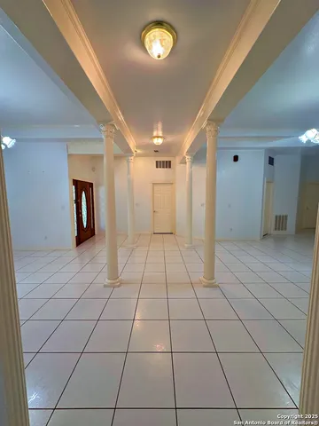 a view of an empty room and window