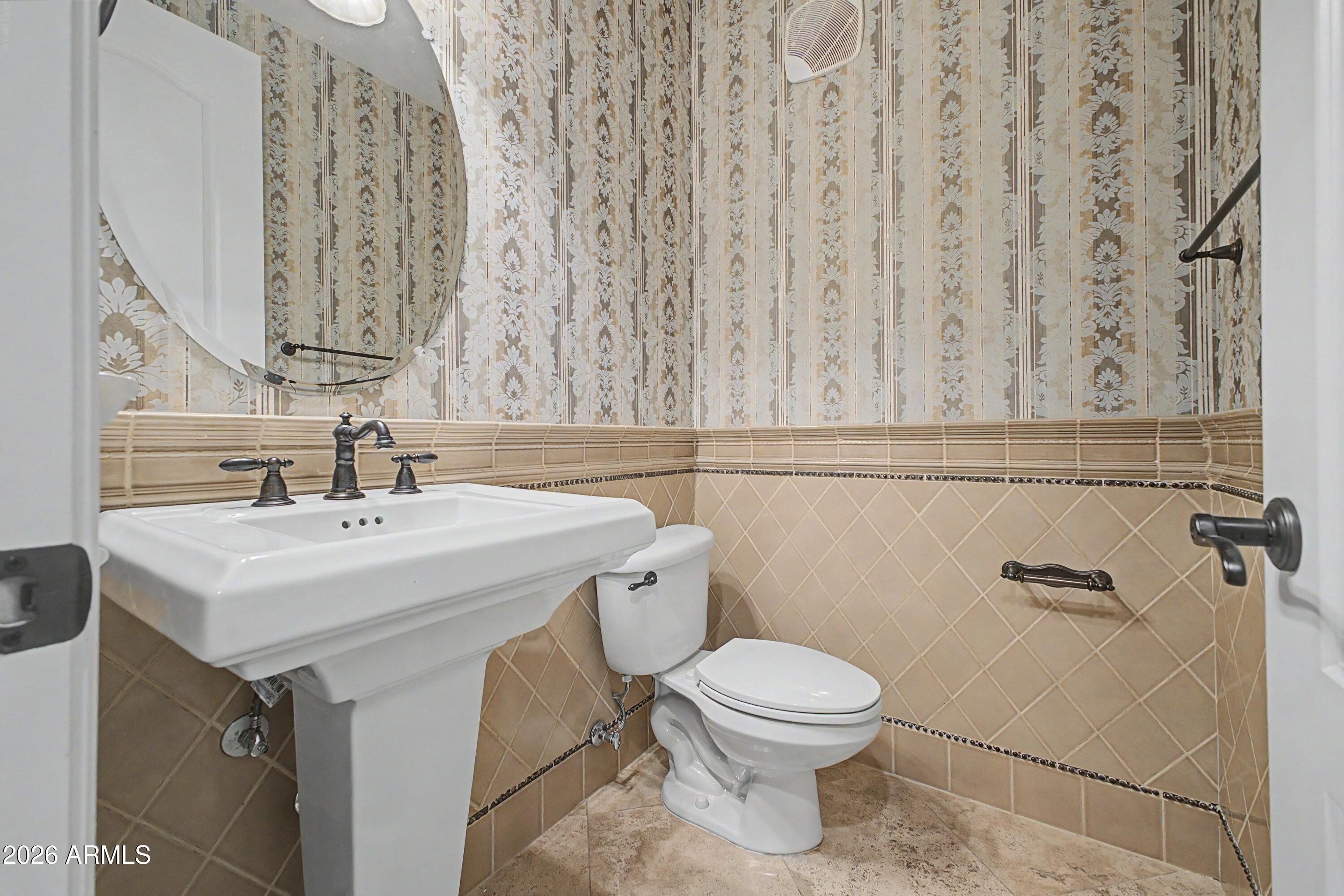 2450 East Roma Avenue Phoenix, AZ 85016 - Photo 9 of 37 Powder bath 2nd floor
