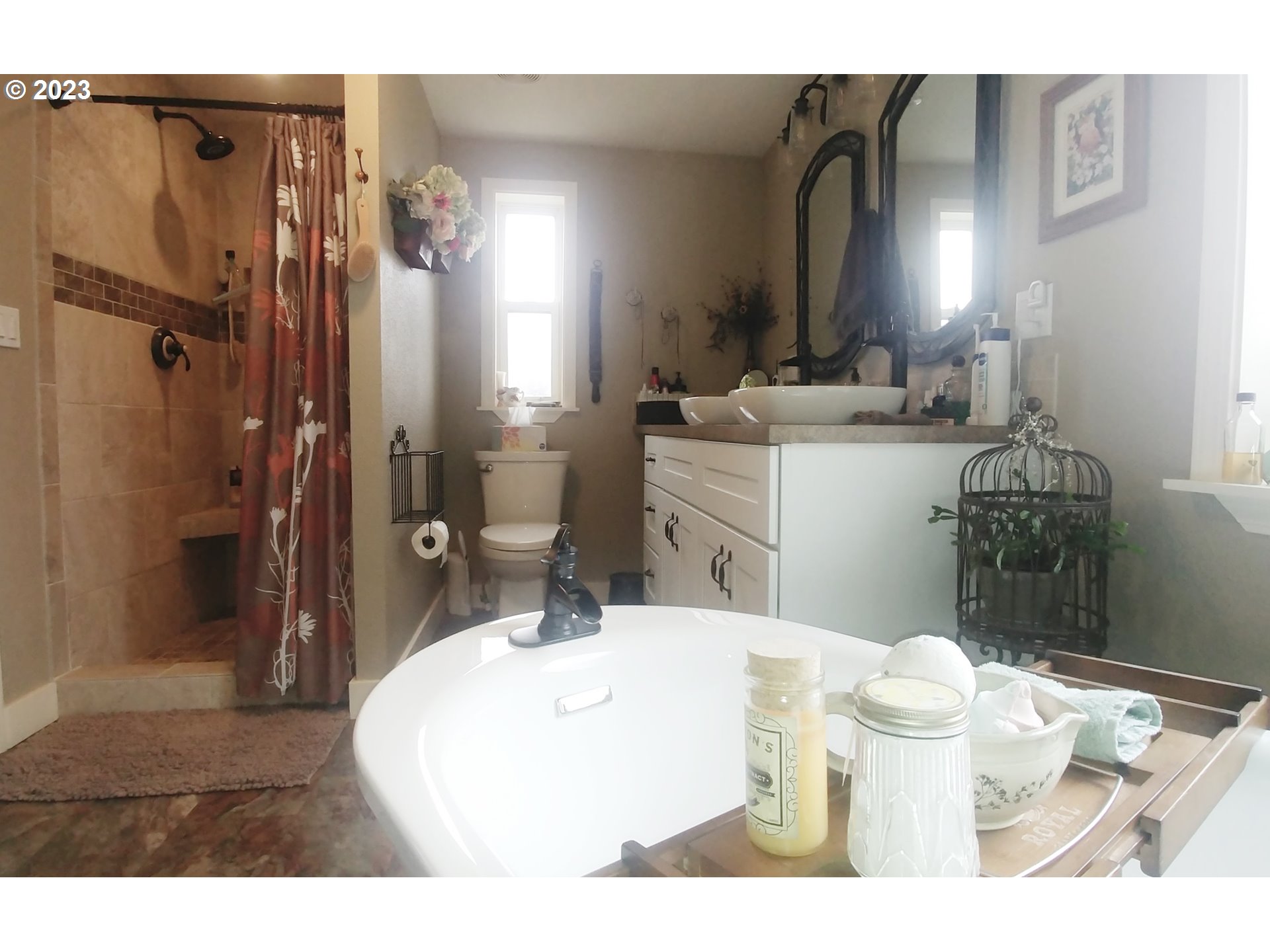 700 North Russell Street Joseph, OR 97846 - Photo 23 of 34 a bathroom with a sink toilet and shower