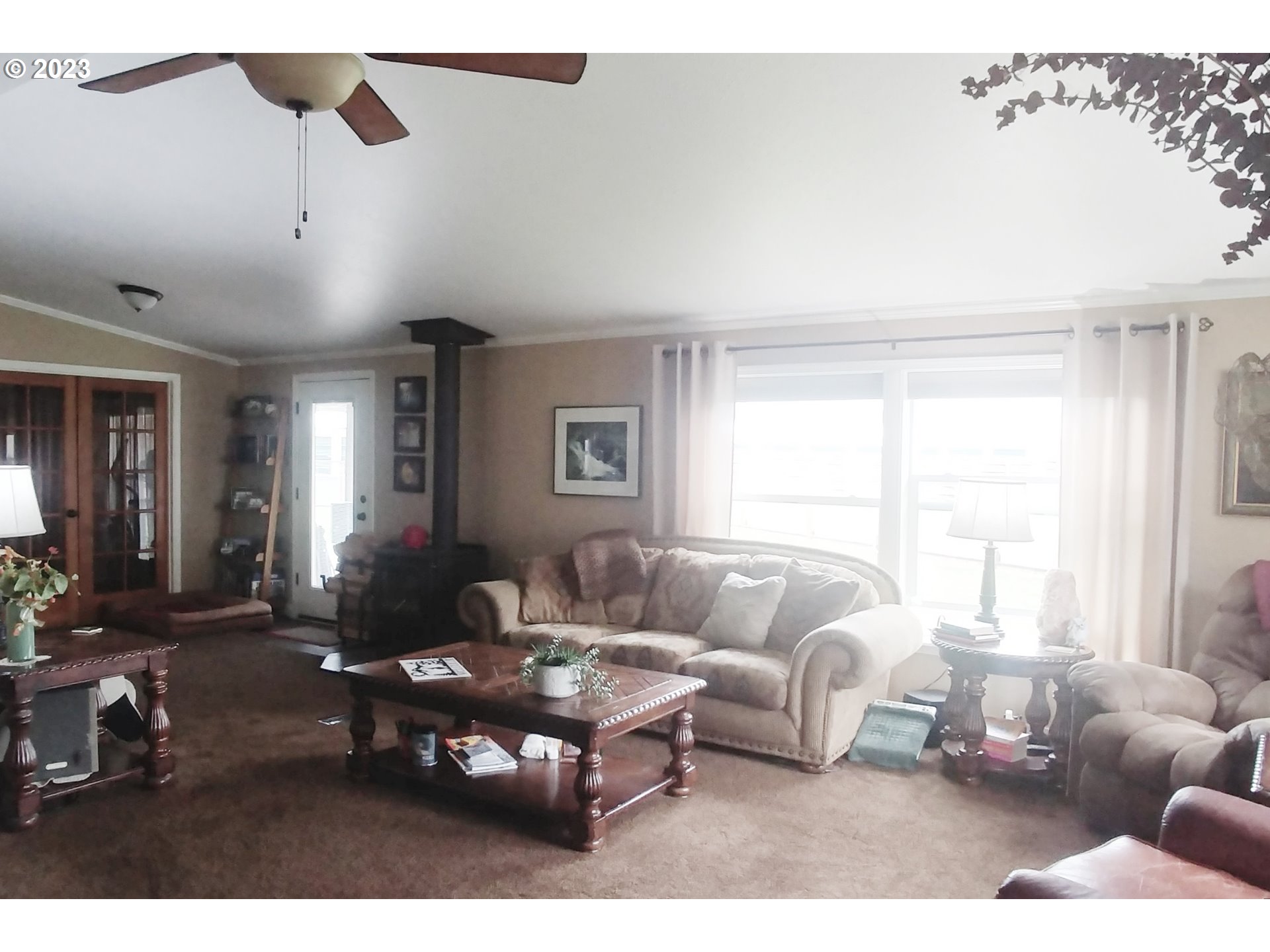 700 North Russell Street Joseph, OR 97846 - Photo 10 of 34 a living room with furniture potted plant and a window
