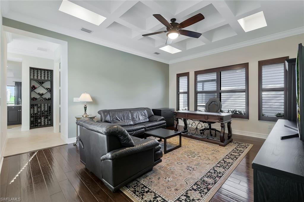 3384 Atlantic Circle Naples, FL 34119 - Photo 24 of 50 a living room with furniture and a large window